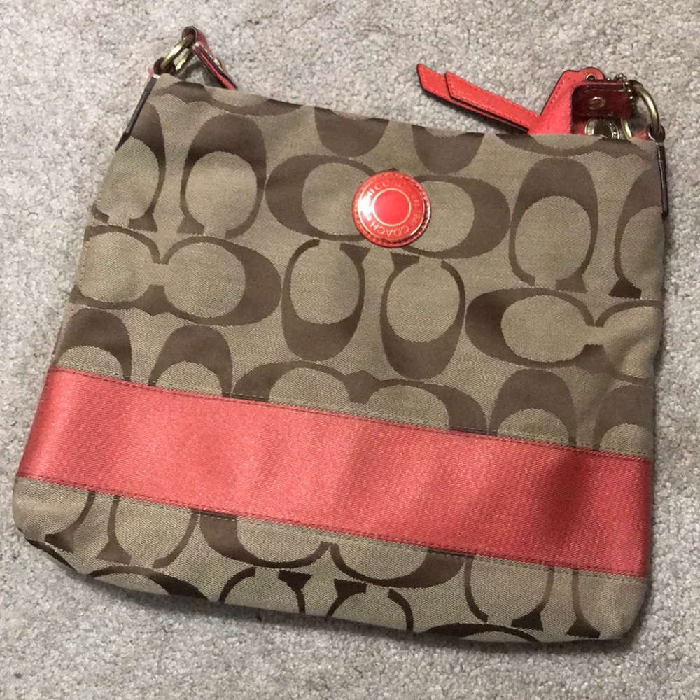 Tan and coral coach crossbody